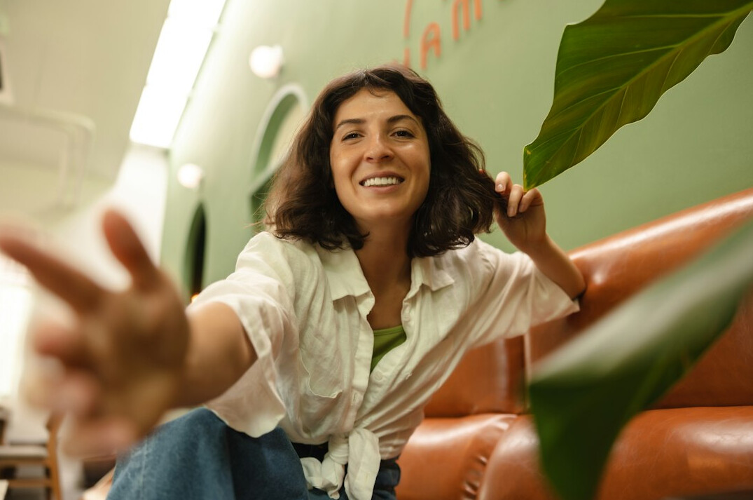 Portrait of a satisfied female startup founder